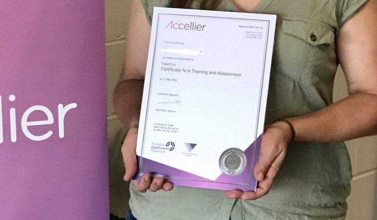 Cert IV TAE graduate holding a Certificate